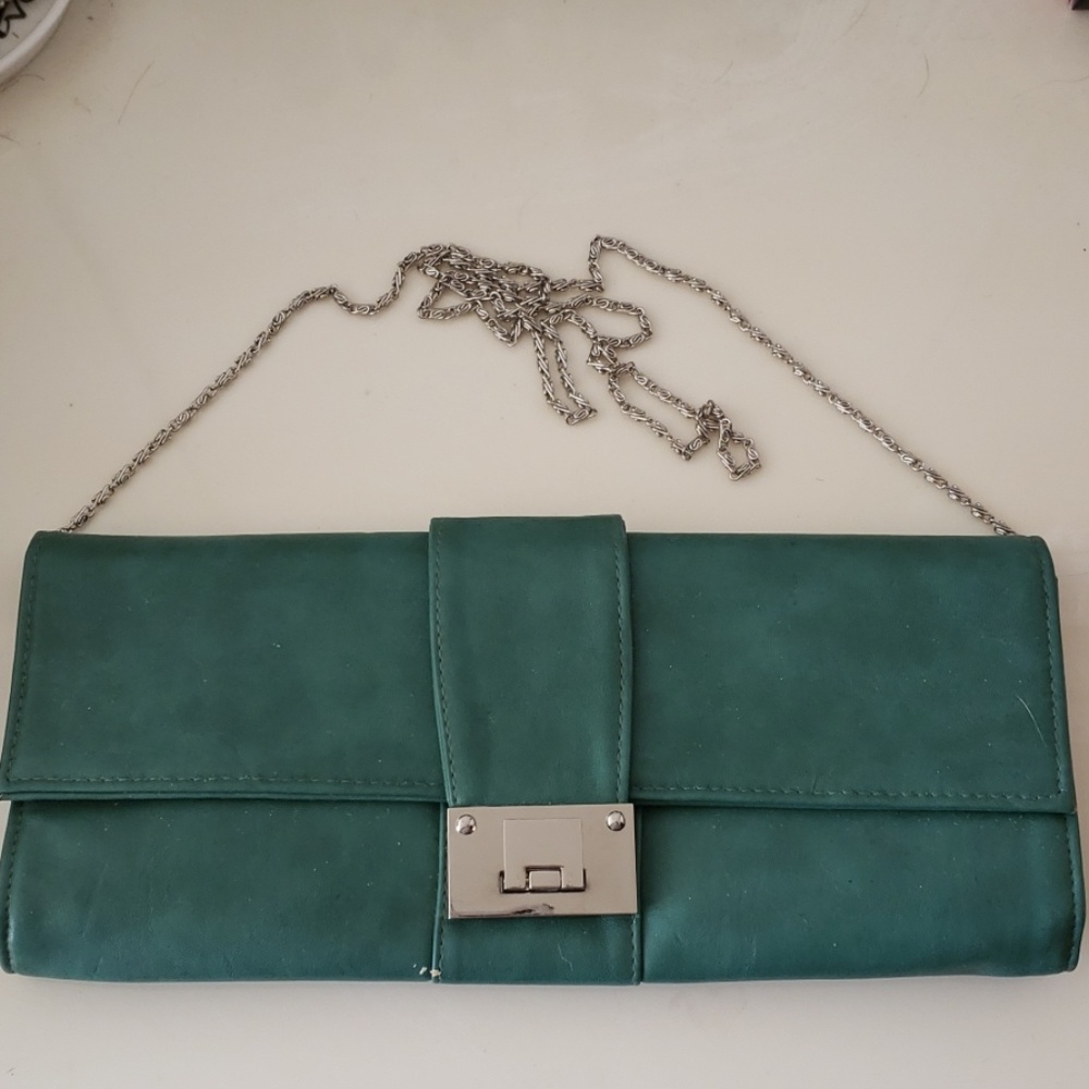 Dark teal clutch/shoulder bag.